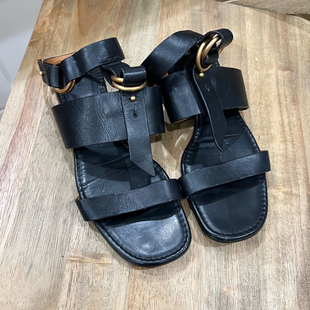 Chloe Black Leather Sandals with Gold Accents